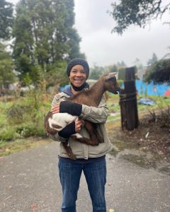Beverly and a goat